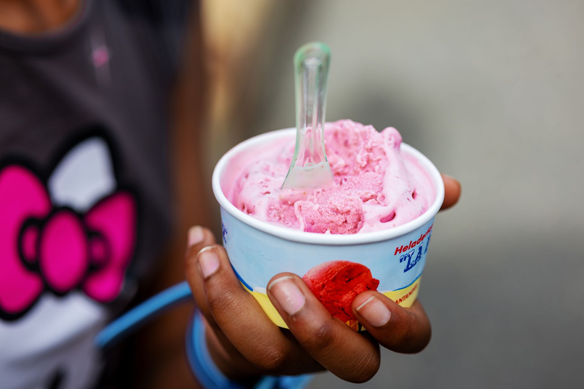 close up of pink ice cream in a cup